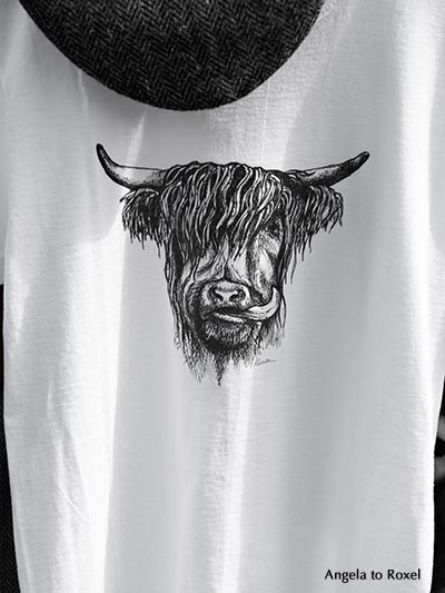 Highland cattle on a T-shirt and a beret overhead, black and white - Portree, Isle of Skye, Highland, Scotland, United Kingdom 2015